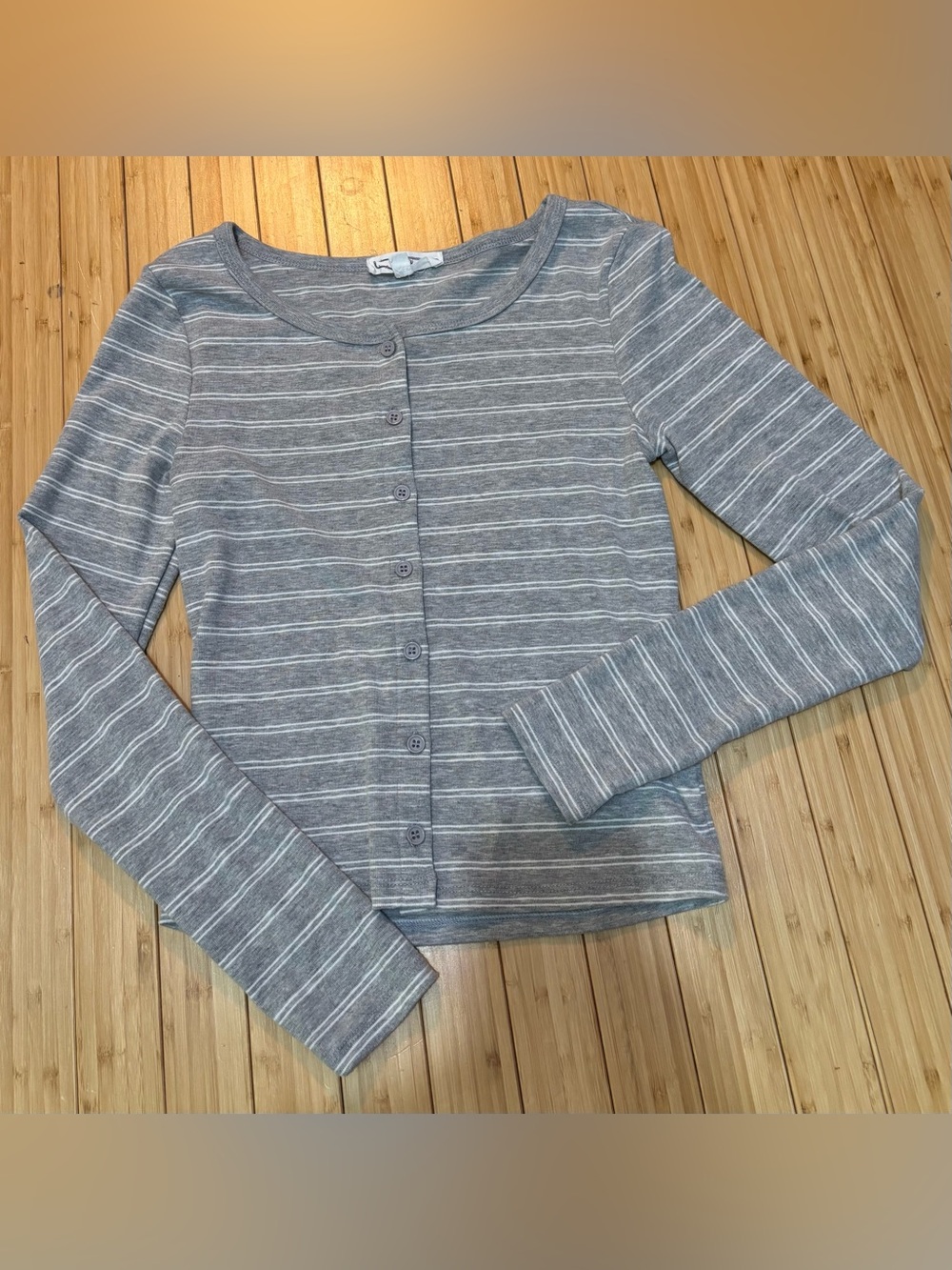 Hippie Rose size S knit button front top. Grey with white stripes.